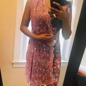 This is a chic pink scarf, stylish and mesh